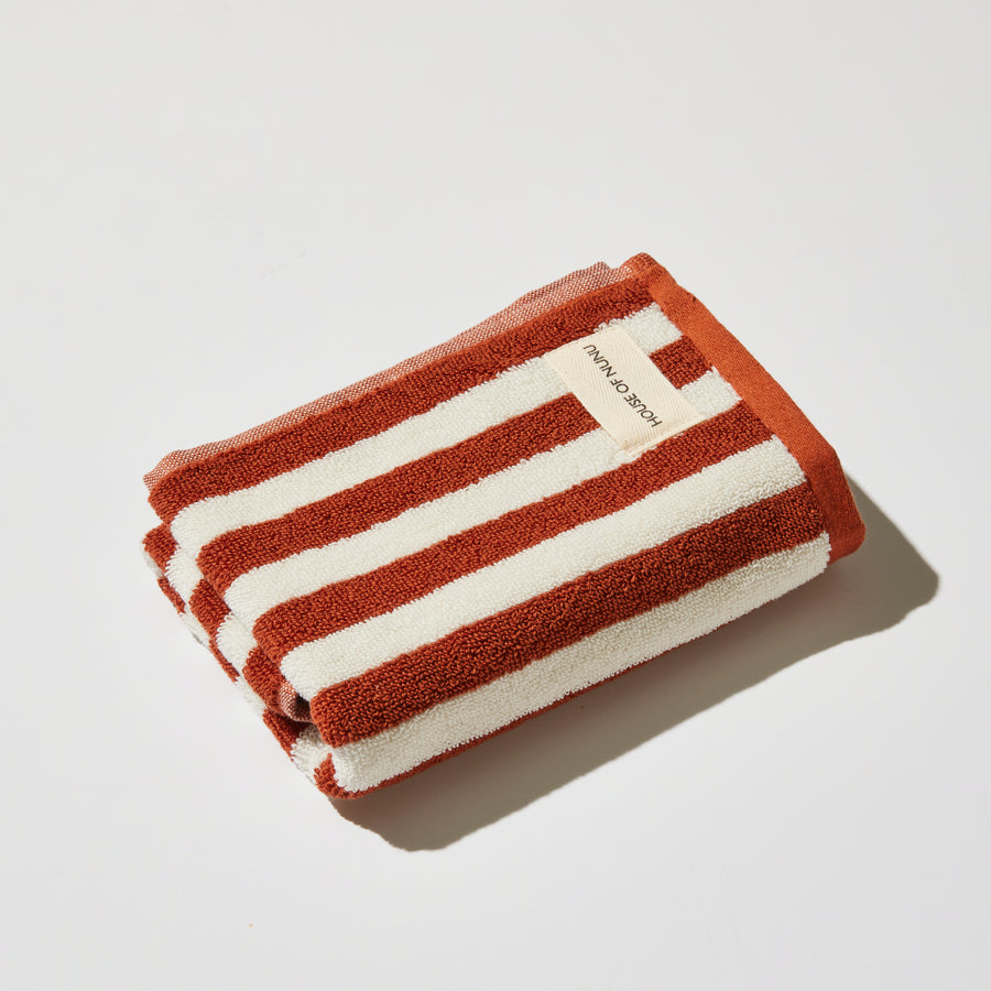 HAND TOWEL IN RED OCHRE STRIPE